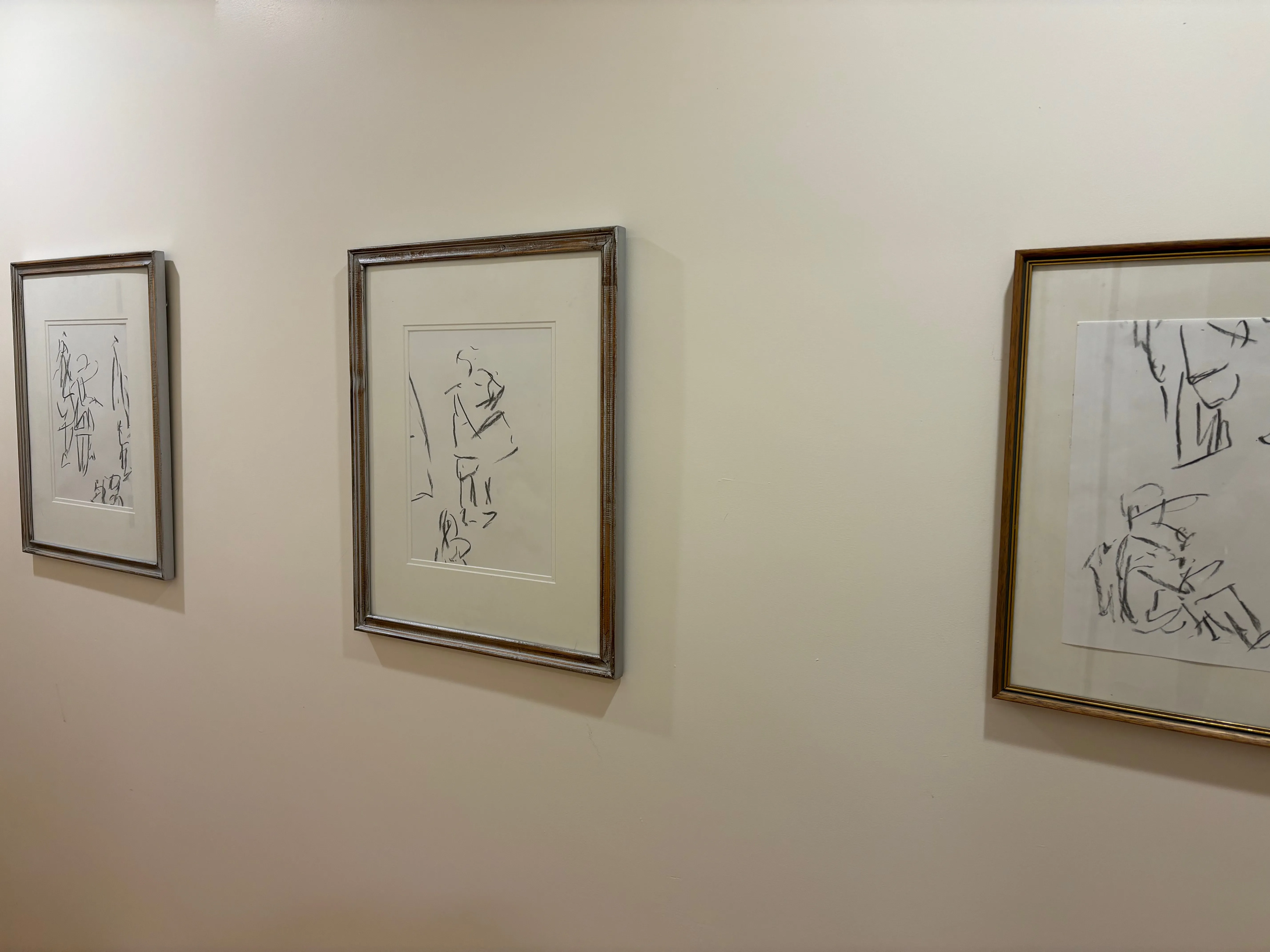 Framed drawings on the wall