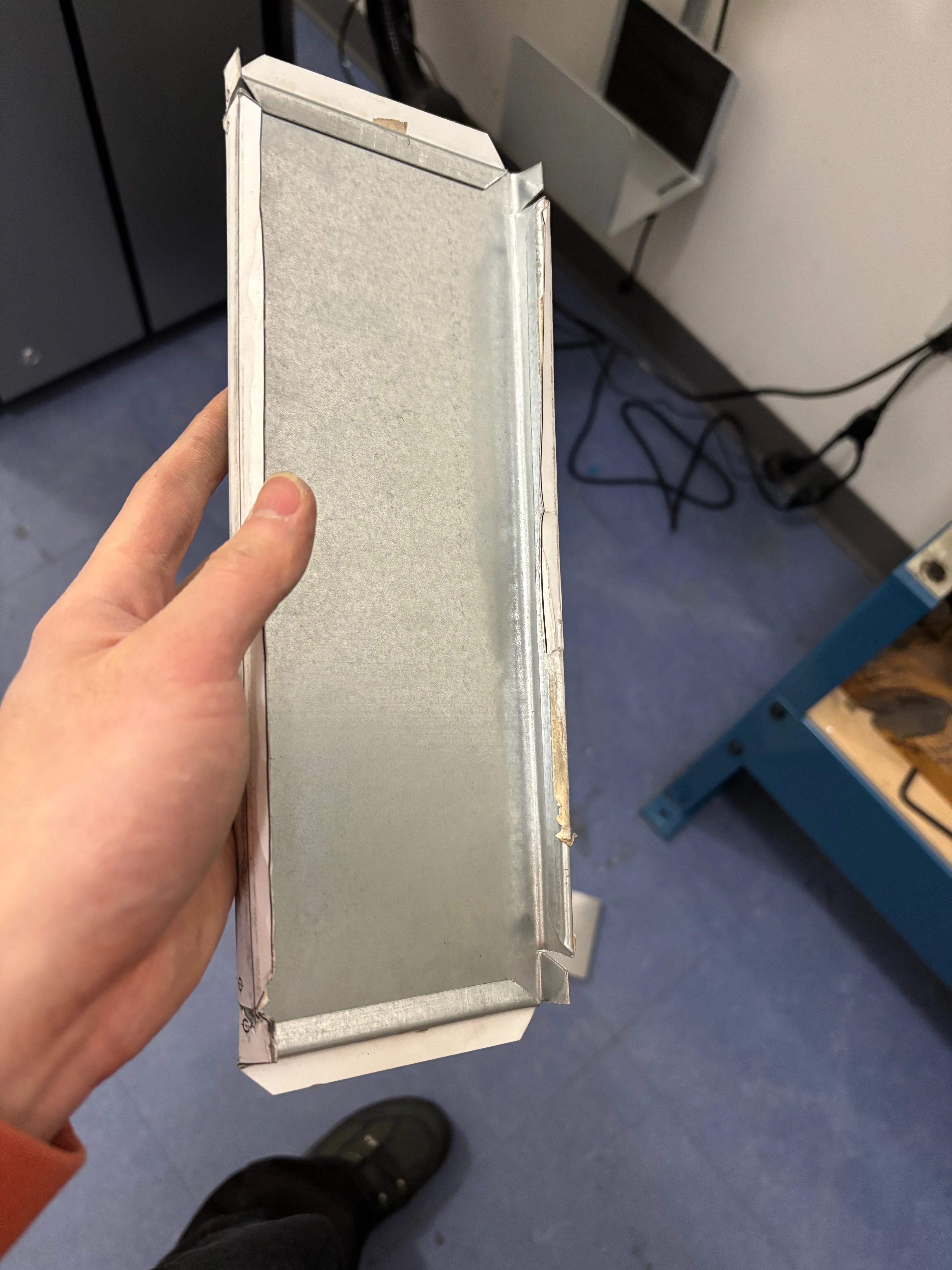 back of the partially folded sheet metal
